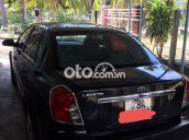 Cần bán lại xe Daewoo Lacetti 1.6 MT năm 2011, màu đen, nhập khẩu nguyên chiếc như mới