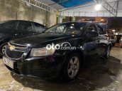 Cần bán Chevrolet Cruze đời 2012, màu đen còn mới