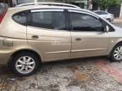 Bán xe Chevrolet Vivant CDX AT đời 2009, màu vàng còn mới