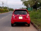 Cần bán xe Chevrolet Spark Zest LTZ AT sản xuất năm 2014, màu đỏ xe gia đình