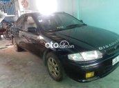 Bán Mazda 323 đời 1998, màu đen còn mới, 90 triệu