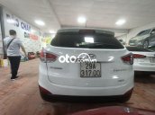 Cần bán lại xe Hyundai Tucson đời 2011, màu trắng, xe nhập chính chủ