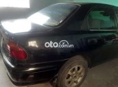 Bán Mazda 323 đời 1998, màu đen còn mới, 90 triệu