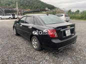 Cần bán gấp Daewoo Lacetti sản xuất năm 2010, màu đen xe gia đình