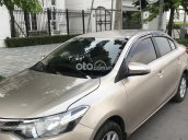 Bán ô tô Toyota Vios đời 2015, màu vàng cát xe gia đình