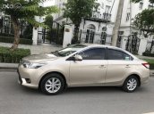 Bán ô tô Toyota Vios đời 2015, màu vàng cát xe gia đình