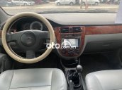 Cần bán gấp Daewoo Lacetti sản xuất năm 2010, màu đen xe gia đình