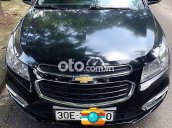 Cần bán Chevrolet Cruze 1.8AT 2016, màu đen xe gia đình