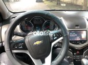 Cần bán Chevrolet Cruze 1.8AT 2016, màu đen xe gia đình