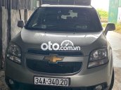 Bán Chevrolet Orlando sản xuất 2014, màu bạc xe gia đình