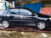 Bán Toyota Corolla Altis 1.3J MT sản xuất năm 2003, màu đen, giá tốt