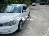 Cần bán gấp Ford Laser năm sản xuất 2004, màu trắng còn mới, 145tr