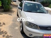 Cần bán gấp Ford Laser năm sản xuất 2004, màu trắng còn mới, 145tr