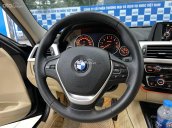 Cần bán BMW 320i năm 2016 xe nhập giá tốt 999tr