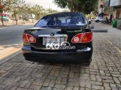 Cần bán lại xe Toyota Corolla Altis đời 1994, màu đen