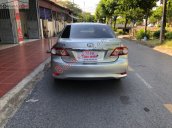 Bán Toyota Corolla Altis 1.8G MT đời 2013, màu bạc số sàn