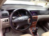 Bán Toyota Corolla Altis 1.8G đời 2004, màu bạc, 188 triệu