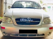 Cần bán gấp Kia Carnival sản xuất năm 2005, màu bạc, xe nhập, 215tr