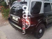 Cần bán Ford Escape sản xuất năm 2003, màu đen, xe nhập xe gia đình