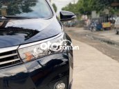 Bán xe Toyota Corolla Altis 2.0V năm 2014, màu đen còn mới giá cạnh tranh