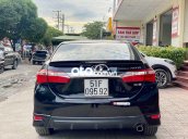 Bán xe Toyota Corolla Altis 2.0V năm 2014, màu đen còn mới giá cạnh tranh