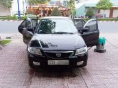 Cần bán Mazda 323 sản xuất 2004, màu đen, giá tốt