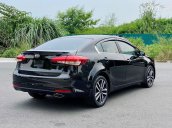 Bán ô tô Kia Cerato 1.6 AT đời 2016, màu đen  