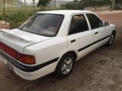 Cần bán gấp Mazda 323 1.6 MT 1995, màu trắng, giá tốt