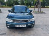 Cần bán Ford Laser GHIA 1.8 MT năm 2004, màu xanh lam 