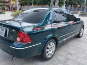 Cần bán Ford Laser GHIA 1.8 MT năm 2004, màu xanh lam 