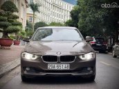 Bán ô tô BMW 320i sản xuất năm 2013, màu nâu, xe nhập, 666 triệu