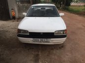 Cần bán gấp Mazda 323 1.6 MT 1995, màu trắng, giá tốt