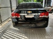 Xe Chevrolet Cruze 1.8 năm 2011, màu đen còn mới, 265 triệu