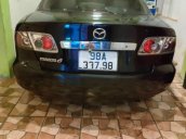 Cần bán Mazda 6 2.0 MT đời 2003, màu đen  