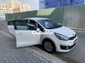 Cần bán lại xe Kia Rio đời 2016, màu trắng, nhập khẩu nguyên chiếc  