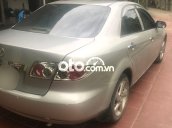 Cần bán gấp Mazda 6 MT 2004, màu vàng cát