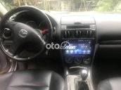 Cần bán gấp Mazda 6 MT 2004, màu vàng cát