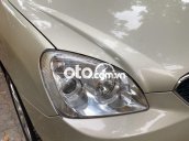 Cần bán gấp Kia Carens SX năm 2012, màu ghi vàng