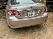 Cần bán lại xe Toyota Corolla AT đời 2013, màu nâu