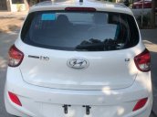 Bán xe Hyundai Grand i10 1.2 AT sản xuất năm 2015, màu trắng, nhập khẩu nguyên chiếc còn mới