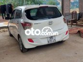 Cần bán gấp Hyundai Grand i10 sản xuất năm 2014, màu trắng, nhập khẩu xe gia đình