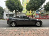 Bán xe BMW 320i năm sản xuất 2014, màu xám, xe nhập