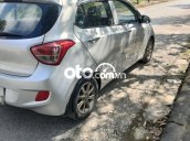 Cần bán xe Hyundai Grand i10 MT năm 2014, màu bạc, xe nhập