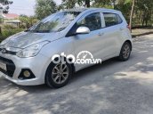 Cần bán xe Hyundai Grand i10 MT năm 2014, màu bạc, xe nhập