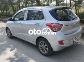 Cần bán xe Hyundai Grand i10 MT năm 2014, màu bạc, xe nhập