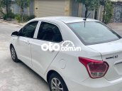 Bán ô tô Hyundai Grand i10 Sedan 1.2MT sản xuất 2016, màu trắng, nhập khẩu