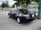 Bán Toyota Camry LE 2.4 năm 2010, màu đen xe gia đình