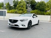 Cần bán gấp Mazda 6 2.0AT, năm sản xuất 2014, màu trắng, chủ dùng rất cẩn thận, giữ gìn, xe nguyên bản 100%