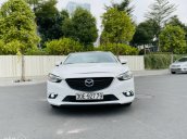 Cần bán gấp Mazda 6 2.0AT, năm sản xuất 2014, màu trắng, chủ dùng rất cẩn thận, giữ gìn, xe nguyên bản 100%