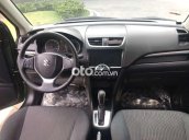 Cần bán xe Suzuki Swift 1.4 AT năm 2017, màu xanh lục, 395tr